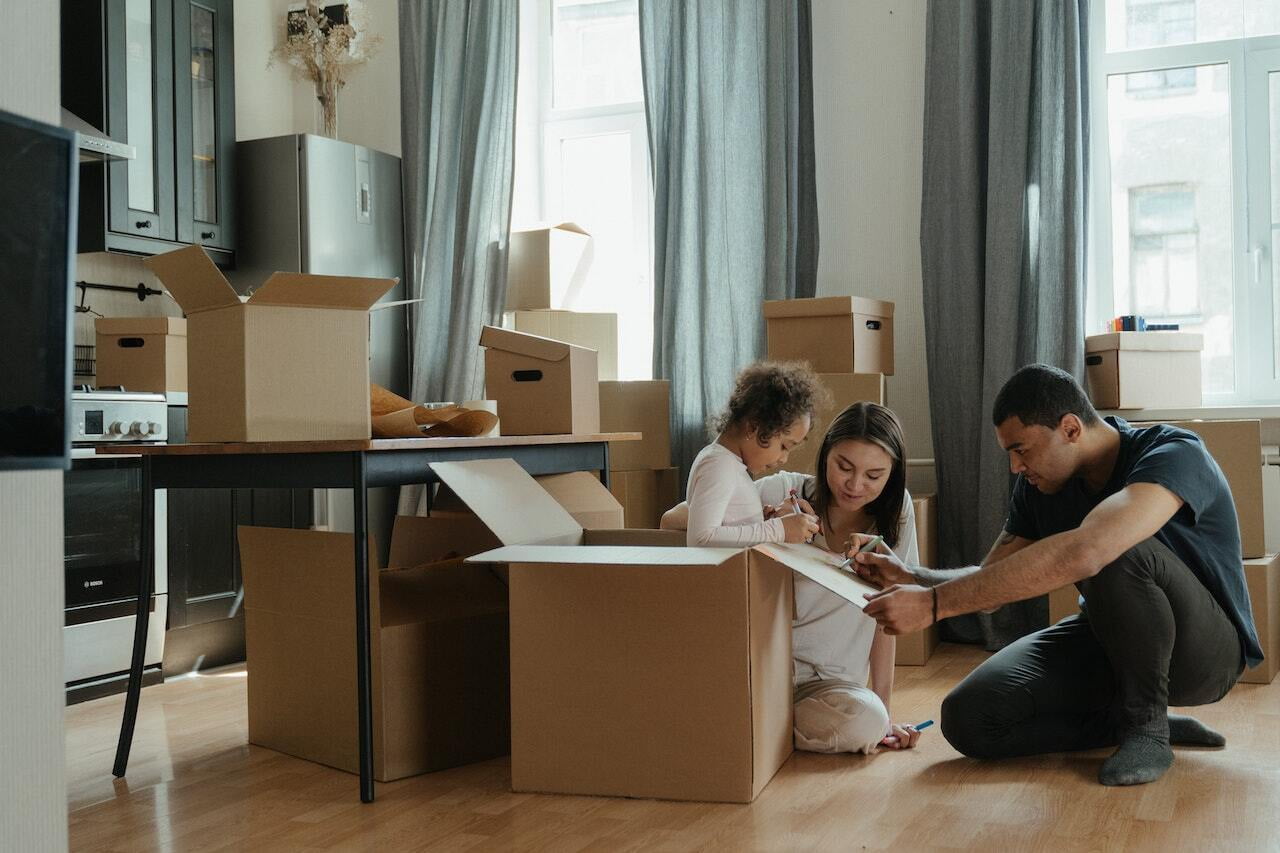 Family Unpacking New House